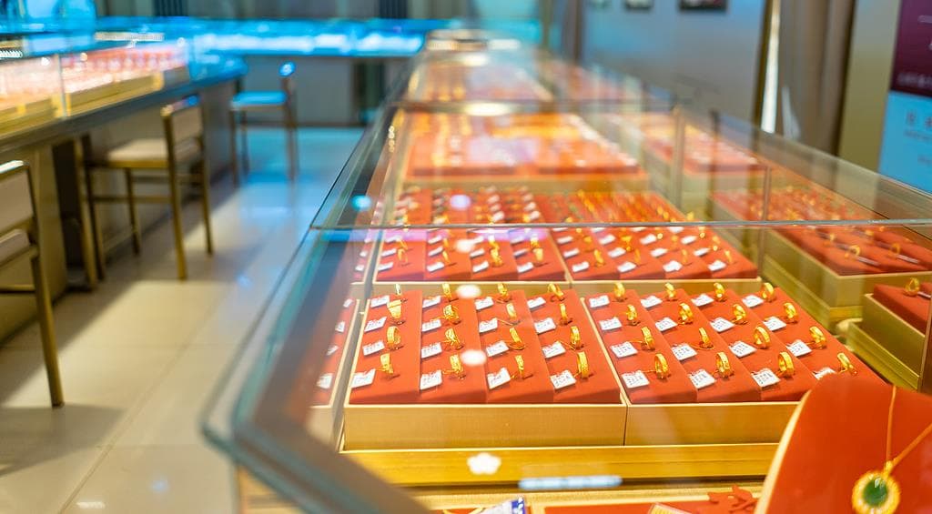 警惕"邮寄黄金"新型诈骗：高收益投资的背后