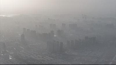 专家:扬沙浮尘天气是内蒙古甘肃宁夏发展的"副产品"