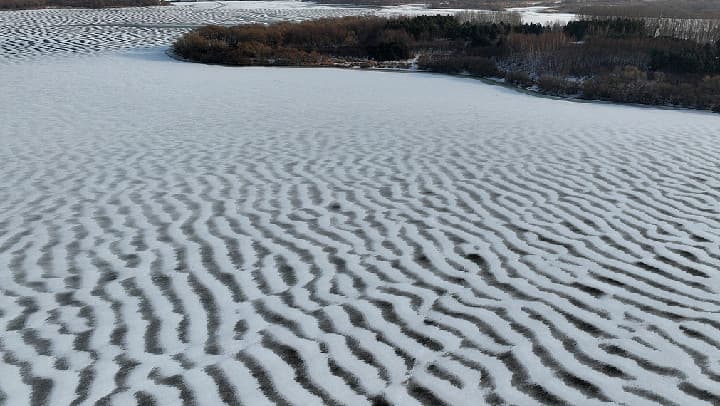 专家称哈尔滨松花江'波浪雪'是气候变化的征兆
